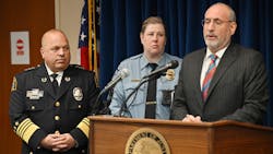St. Paul Police Chief Todd Axtell (left) and Minneapolis Interim Police Chief Amelia Huffman listen as U.S. Attorney Andrew Luger speaks during a news conference Tuesday to announce a series of federal and local law enforcement strategies aimed at reducing violent crime in the Twins Cities metro area.