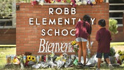 Family members who lost a sibling place flowers outside Robb Elementary School in Uvalde, Texas, on Wednesday, a day after a teen gunman killed 19 students and two teachers. Family members who lost a sibling place flowers outside Robb Elementary School in Uvalde, Texas, on Wednesday, a day after a teen gunman killed 19 students and two teachers.