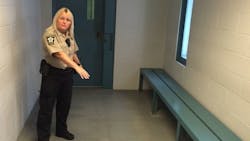 Assistant Lauderdale County, AL, Jail Director Vicky White shows a holding cell for inmates awaiting transfer in 2016. Assistant Lauderdale County, AL, Jail Director Vicky White shows a holding cell for inmates awaiting transfer in 2016.