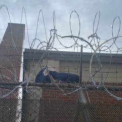 An inmate at the Androscoggin County, ME, Jail had his pants and underwear ripped off while trying to squeeze through two rows of barbed wire during an escape Monday. An inmate at the Androscoggin County, ME, Jail had his pants and underwear ripped off while trying to squeeze through two rows of barbed wire during an escape Monday.