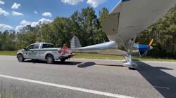Clay County, FL, deputies helped a pilot take off again after making an emergency landing on the highway Thursday. Clay County, FL, deputies helped a pilot take off again after making an emergency landing on the highway Thursday.