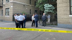 Detectives investigate outside a home in the Bronx where authorities say an off-duty NYPD officer was stabbed and killed by her husband early Monday. Detectives investigate outside a home in the Bronx where authorities say an off-duty NYPD officer was stabbed and killed by her husband early Monday.