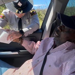 A photo of North Carolina State Highway Patrol Trooper Jared Doty praying with Anthony “Tony” Geddis during a traffic stop was posted to social media by Geddis' daughter, Ashlye V. Wilkerson, and it not only went viral but sparked a friendship between Doty's and Wilkerson's families. A photo of North Carolina State Highway Patrol Trooper Jared Doty praying with Anthony “Tony” Geddis during a traffic stop was posted to social media by Geddis' daughter, Ashlye V. Wilkerson, and it not only went viral but sparked a friendship between Doty's and Wilkerson's families.