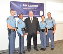 After working closely with Thin Blue Defend to help develop and test the Thin Blue Defend, Columbia County Sheriff Clay Whittle (center) with (L to R) Deputy Brandon Price, Deputy Regina Flemming, Deputy Sharon Taylor and Sergeant Josh Bogdanow discuss the benefits of the app after becoming the first in the nation to deploy it to their entire force. orce. After working closely with Thin Blue Defend to help develop and test the Thin Blue Defend, Columbia County Sheriff Clay Whittle (center) with (L to R) Deputy Brandon Price, Deputy Regina Flemming, Deputy Sharon Taylor and Sergeant Josh Bogdanow discuss the benefits of the app after becoming the first in the nation to deploy it to their entire force. orce.