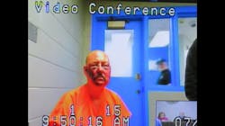 Lance Storz, accused of murdering two police officers during a stand-off in Floyd County, KY, appears by video from jail for his arraignment Friday. Lance Storz, accused of murdering two police officers during a stand-off in Floyd County, KY, appears by video from jail for his arraignment Friday.
