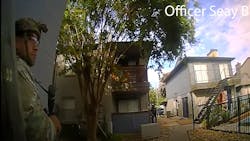 Houston police officers wait outside an apartment complex during a six-hour standoff in June with a suspect accused of shooting and wounding an officer in both legs. Houston police officers wait outside an apartment complex during a six-hour standoff in June with a suspect accused of shooting and wounding an officer in both legs.