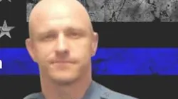 St. Marys, KS, Police Officer Mark Lamberson.