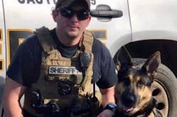 Bibb County, AL, Sheriff's Deputy Brad Johnson and his longtime K-9 partner, Bodie. Bibb County, AL, Sheriff's Deputy Brad Johnson and his longtime K-9 partner, Bodie.