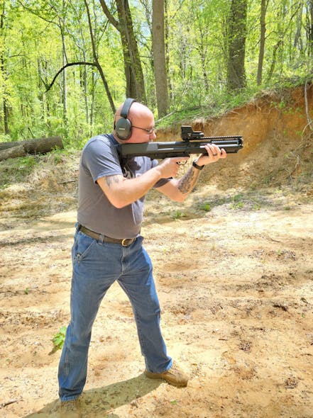 Frank is seen with the KelTec KSG shotgun.