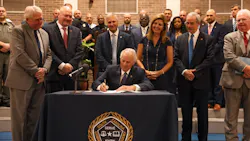 Surrounded by state police leaders, South Carolina Gov. Henry McMaster (center) signs a law Thursday that establishes new state police standards. Surrounded by state police leaders, South Carolina Gov. Henry McMaster (center) signs a law Thursday that establishes new state police standards.