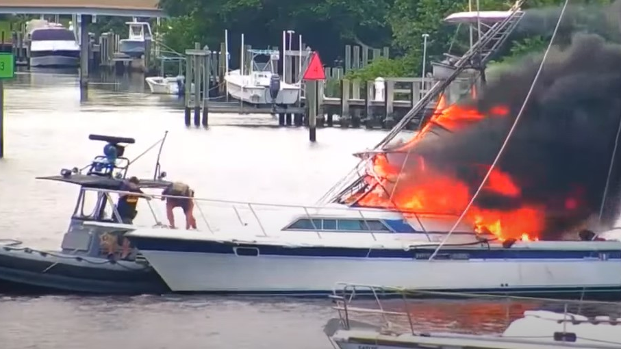 Martin County, FL, sheriff's deputies rescued an unconscious man from a large fishing boat that burst into flames on the Manatee Pocket waterway near Stuart on Sunday.