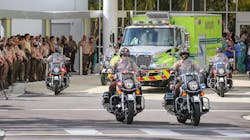 Motorcycle officers escort Miami-Dade Police Det. Cesar Echaverry from Jackson Memorial Hospital to the Miami-Dade County Medical Examiner's Department. Motorcycle officers escort Miami-Dade Police Det. Cesar Echaverry from Jackson Memorial Hospital to the Miami-Dade County Medical Examiner's Department.