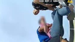 New Haven, CT, police officers saved a distraught woman who was on the ledge of a parking garage roof Aug. 6. New Haven, CT, police officers saved a distraught woman who was on the ledge of a parking garage roof Aug. 6.