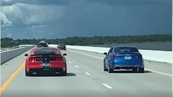 Two street racers on a Santa Rosa Beach, FL, bridge were caught in the act Wednesday after they revved up in front of the Walton County Sheriff&apos;s Office&apos;s chief of operations.