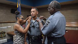 Sheron Knight receives his corporal insignia during a promotion ceremony for the Oragneburg County, SC, Sheriff&apos;s Department last month.