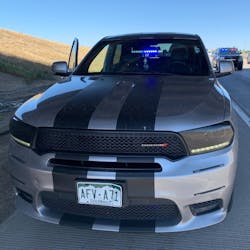 An off-duty law enforcement officer was pulled over in Brighton, CO, on Saturday by a phony police officer in an unmarked car with flashing blue lights.