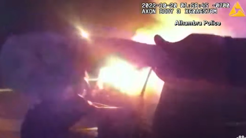 Watch Calif. Police Save Driver from Burning Vehicle after Crash | Officer