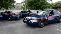 Atlanta police officers in the Zone 6, East Precinct, inspect and swap out patrol cars before deploying in the area in 2013.