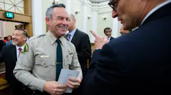 Riverside County, CA, Sheriff Chad Bianco greets Riverside County District Attorney Mike Hestrin after he took the oath of office for his second term in 2019.