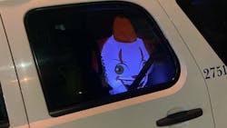 A 4-foot, illuminated, inflatable 'evil clown' stares out of the window of St. Tammany Parish, LA, Sheriff's Deputy David Arriaza's patrol unit. A 4-foot, illuminated, inflatable 'evil clown' stares out of the window of St. Tammany Parish, LA, Sheriff's Deputy David Arriaza's patrol unit.