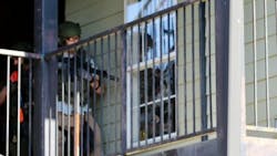 Tuscaloosa police rescued two young boys after an hourslong standoff Sunday. Tuscaloosa police rescued two young boys after an hourslong standoff Sunday.