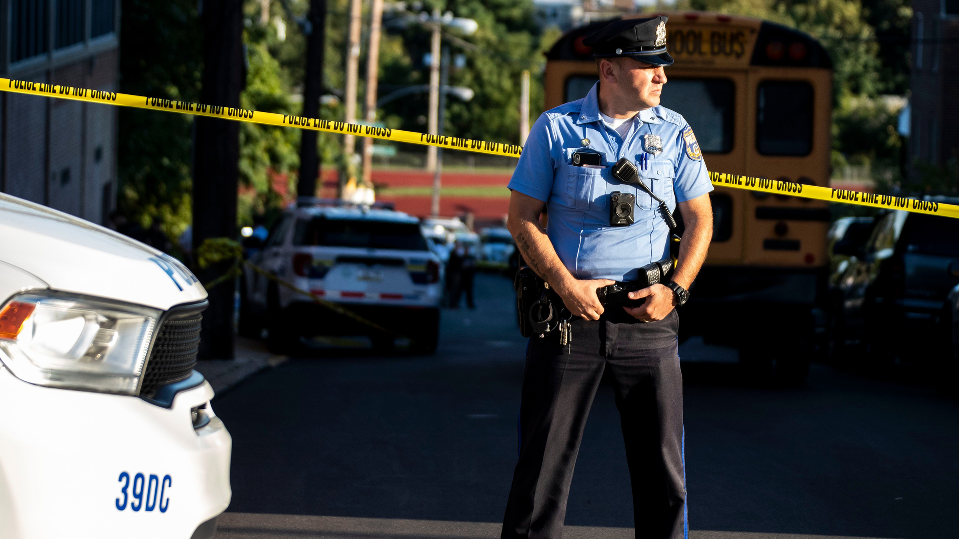 Police walking on the scene of a shooting last month. The Philadelphia Police Department has been plagued by staffing issues and doesn't keep robust data on its crime-fighting strategies, according to a review by City Controller Rebecca Rhynhart's office.