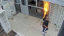 Surveillance footage shows a man setting fire to the guard booth outside the FBI Chicago headquarters on Nov. 4. Surveillance footage shows a man setting fire to the guard booth outside the FBI Chicago headquarters on Nov. 4.