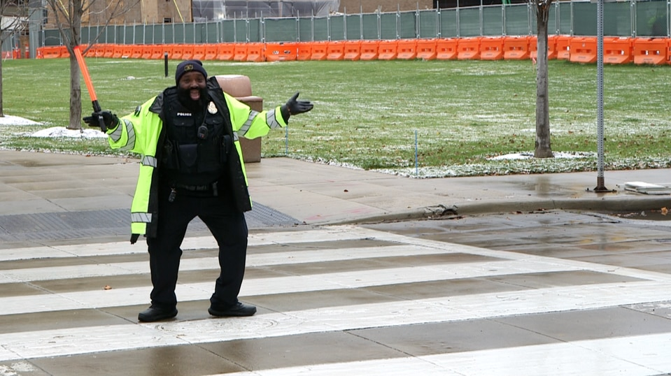 Cpl. Eric Hudson, a member of Cleveland Clinic&rsquo;s police department, has introduced dance moves to his volunteer shift as a crossing guard.