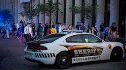 Workers evacuate the offices of Dallas County Health and Human Services head toward the parking lot as police respond to an active-shooter call at the Dallas County medical examiner’s office Tuesday. Workers evacuate the offices of Dallas County Health and Human Services head toward the parking lot as police respond to an active-shooter call at the Dallas County medical examiner’s office Tuesday.