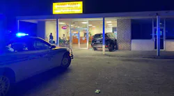 Two Mullins, SC, police officers suffered minor injuries after an SUV crashed into the restaurant where they were eating Monday.