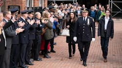 NYPD Chief of Department Kenneth Corey is saluted by dozens of uniformed officers and other officials during his walkout ceremony with his family Tuesday. NYPD Chief of Department Kenneth Corey is saluted by dozens of uniformed officers and other officials during his walkout ceremony with his family Tuesday.