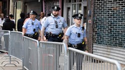 Philadelphia police officers patrol South Street on June 11, a week after a mass shooting on the popular street. Philadelphia police officers patrol South Street on June 11, a week after a mass shooting on the popular street.