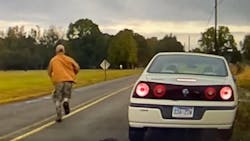 A passenger in a car stopped by a Pottsville, AR, police officer quickly jumped out and fled on foot across an open field Sunday. A passenger in a car stopped by a Pottsville, AR, police officer quickly jumped out and fled on foot across an open field Sunday.