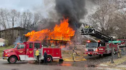 St. Paul, MN, police officers rescued a person and a dog from a two-story house fire Thursday.