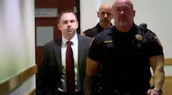 Former Fort Worth, TX, Police Officer Aaron Dean (left) enters Tarrant County’s 396th District Court on Thursday.