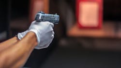 Inside the Baltimore Police Department firearms range, forensic scientist Zoë Krohn demonstrated her job during an open house. Inside the Baltimore Police Department firearms range, forensic scientist Zoë Krohn demonstrated her job during an open house.