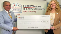 Henry Repeating Arms CEO & Founder Anthony Imperato (L) presenting a $50,000 donation to First Responders Children’s Foundation President & CEO Jillian Crane (R) at the organization’s headquarters in New York City.