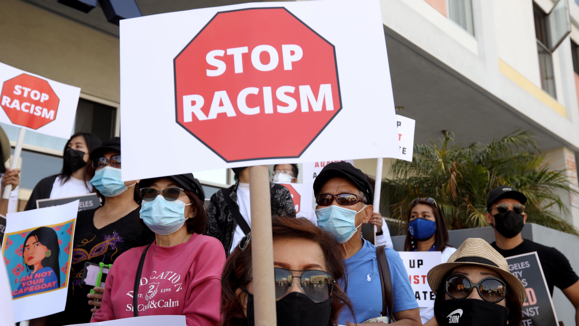 Members of the Thai-American community participate in a rally against Asian hate crimes in Thai Town in Los Angeles.