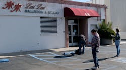 Reporters gather at Lai Lai Ballroom and Studio in Alhambra, CA, on Sunday. Reporters gather at Lai Lai Ballroom and Studio in Alhambra, CA, on Sunday.
