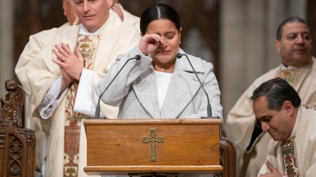 Dominque Luzuriaga, widow of NYPD Det. Jason Rivera, announces that she is pregnant with a child from her late husband at a memorial at St. Patrick's Cathedral in New York City on Saturday, marking one year since Rivera and his partner, Wilbert Mora, were gunned down in an ambush during a 2022 domestic violence incident.