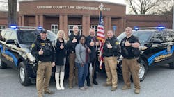 Former wrestler &apos;Hacksaw&apos; Jim Duggan (center) met with and thanked the dispatcher and deputies who helped him with a home intruder in December.