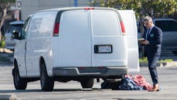 Investigators check out a van where the driver is suspected in a mass shooting at a Monterey Park, CA, dance studio Sunday that killed 10. Investigators check out a van where the driver is suspected in a mass shooting at a Monterey Park, CA, dance studio Sunday that killed 10.