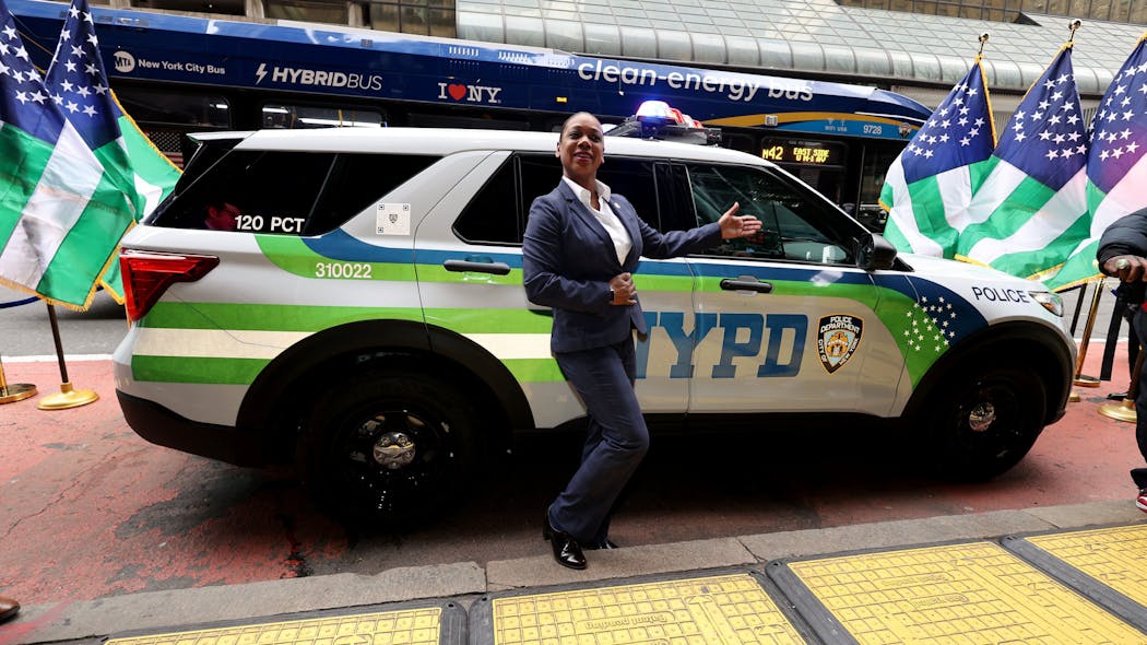 NYPD Commissioner Keechant Sewell poses for pictures next to a newly designed patrol vehicle in Manhattan on Wednesday. NYPD Commissioner Keechant Sewell poses for pictures next to a newly designed patrol vehicle in Manhattan on Wednesday.