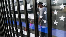 Small memorials, including a Thin Blue Line flag, remain days after dozens of Los Angeles County Sheriff recruits on a training run were struck by a man driving an SUV on Nov. 2 in Whittier. Small memorials, including a Thin Blue Line flag, remain days after dozens of Los Angeles County Sheriff recruits on a training run were struck by a man driving an SUV on Nov. 2 in Whittier.