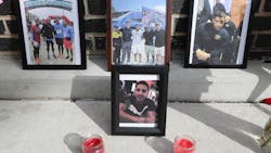 Photos rest against a house at a memorial for the fallen Temple University police officer, Christopher Fitzgerald, near 17th Street and Montgomery Avenue in North Philadelphia on Sunday. He was fatally shot Saturday night. Photos rest against a house at a memorial for the fallen Temple University police officer, Christopher Fitzgerald, near 17th Street and Montgomery Avenue in North Philadelphia on Sunday. He was fatally shot Saturday night.