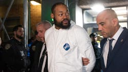 Randy 'Popper' Jones is led from the NYPD's 75th Precinct station in Brooklyn on Tuesday. Randy 'Popper' Jones is led from the NYPD's 75th Precinct station in Brooklyn on Tuesday.