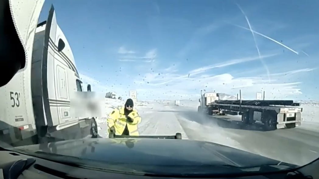 Dashcam footage shows a Wyoming Highway Patrol trooper nearly being struck by an out-of-control tractor trailer while the trooper was responding to an earlier accident along Interstate 80 near Rawlins.