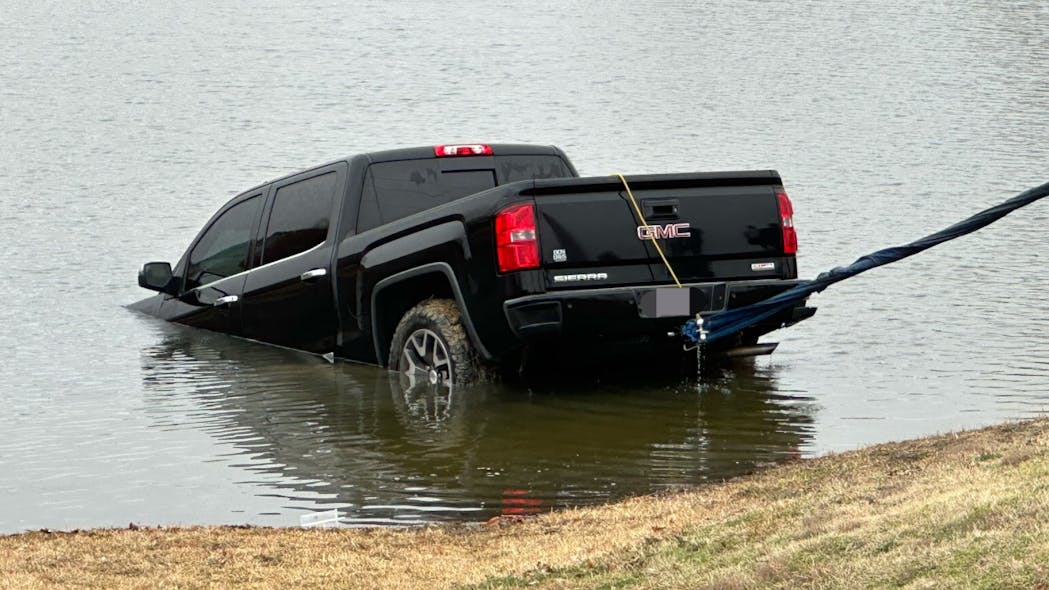 Tarrant County, TX, sheriff's deputies rescued a woman from a submerged pickup truck after she accidentally drove the vehicle into a pond Tuesday. Tarrant County, TX, sheriff's deputies rescued a woman from a submerged pickup truck after she accidentally drove the vehicle into a pond Tuesday.