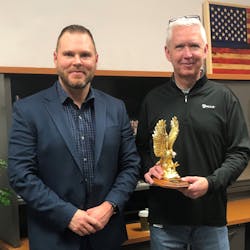 ASP Mideast US Sales Director Aaron Hill (l.) presents Premier Partner Award to Galls CEO Mike Fadden (r.). ASP Mideast US Sales Director Aaron Hill (l.) presents Premier Partner Award to Galls CEO Mike Fadden (r.).