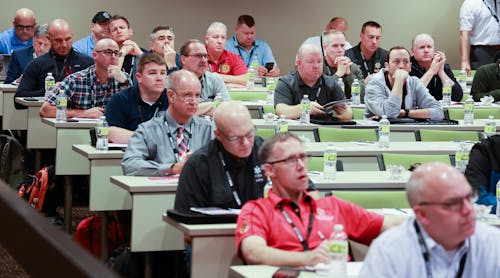 Attendees are seen during the Law Enforcement Track of the 2022 Station Design Conference.